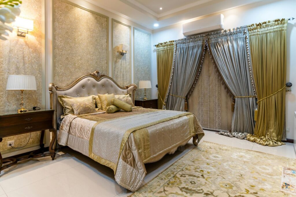 Meta Description: Are you looking to update your area? Find the top 10 ideas for bedroom decor to help you create a chic and comfortable haven. Browse the top products to modernize your bedroom! Make Your Bedroom More Attractive With 10 Ideas For Bedroom Decor Are you confused about your bedroom looks? I have 10 ideas for bedroom decor which can solve your problem regarding decoration. Follow 10 ideas for bedroom decor to make your bedroom look stunning. This article is a complete guide to changing your bedroom or adorning it with beauty. What Are 10 ideas for bedroom decor? Here are some ways to make your bedroom stylish and modern: Follow these ten ideas. 1. Include a Headboard Statement A striking headboard is one of the simplest ways to update your bedroom. Your area can be quickly elevated with a sleek hardwood finish or tufted velvet style. A striking headboard adds sophistication and style by serving as a focal point. If you want a style that is within your budget, you can look through possibilities on Wayfair or Overstock. 2. Use Layered Textures for Coziness If you want your bedroom to feel cozier, think about overlaying different materials. Imagine soft rugs, fluffy cushions, and warm knit blankets. This combination of textures gives your space depth and coziness, giving it the ideal place to relax after a demanding day. Look no further than West Elm for superior accessories and bedding. 3. Opt for Neutral with Vibrant Colors A neutral color scheme is classic and creates a peaceful, tranquil atmosphere in your bedroom. Your room will gain individuality by using colorful pillows, rugs, or artwork as accent pieces. Keep the base color neutral and change the accent color when you desire it instead of committing to dramatic walls. For bright art and décor, Etsy and Society6 provide some fantastic selections. 4. Establish a Reading Cozy Why not set up a comfortable reading nook in your bedroom if you've got a little more room?A comfortable seat, an extravagant cover, and a somewhat side table to hold a book or some tea are all you want. It's a simple method for giving your room more style and utility. 5. Incorporate Organic Components Natural elements may create amazing bedroom décor. To give your space a more natural feel, add rattan furniture, indoor plants, or wooden accents. In addition to being lovely, plants like pothos and snake plants help enhance the quality of the air. Look through The Sill for ideas for indoor plants that go with any type of design. 6. Use Wall Art to Make a Statement Remember the walls! A gallery wall or statement wall can add refinement and individuality to your bedroom. Wall decor can change the entire appearance, whether it's framed quotes, an abstract painting, or a photo gallery. Affordable pieces are available at Desenio and Minted. 7. Enhance Ambient Lighting A sufficiently bright room is pivotal for making the right air. For a warm, welcoming feel, layer the lighting with a mix of pendant lights, sconces, and bedside lights. Another reasonably priced option to add charm and softness is with string lights. Visit Target or Home Depot to find fashionable options. 8. Make a Chic Window Treatment Purchase Window medicines, like blinds or draperies, can essentially change your room's appearance. To make a marvelous feeling, pick streaming textures made of light, breezy materials like cotton or cloth.At Target, you can look at reasonably priced yet fashionable selections. Combine geometric patterns, neon lighting, and minimalist artwork with modern furniture for an eccentric look. To keep it interesting, add splashes of vivid color. How can I arrange a space simply? Keep your bedroom design basic with a few well-chosen accessories, a neutral color scheme, and clean lines. Keep things simple and purposeful with your furniture selection. 9. Use Style to Maximize Storage Add stylish and practical storage solutions to your bedroom to clear it of clutter. Consider adding stylish drawers, ornamental baskets, or under-bed storage to your space. A room that is well-kept and orderly appears larger and more serene. Go to The Container Store for creative storage solutions. 10. Add a personal touch with distinctive décor Lastly, add a personal touch to your bedroom by decorating it differently. These small touches, such as family photos, handcrafted items, or vintage finds, give your bedroom a homey vibe. Look through shops like Anthropologie to find unique and exquisite home décor pieces. Conclusion Your bedroom doesn't have to be overly decorated. These ten gorgeous bedroom design ideas provide you with doable yet fashionable ways to furnish a space that is both lovely and useful. You may simply modify these ideas to meet your own style, whether you like a comfortable bohemian vibe or futuristic simplicity. Frequently Asked Questions about Bedroom Design Q, What is a stylish bedroom like? Selecting an idea or color scheme is the first step in styling your bedroom. To create a place that expresses your personality, layer different materials, add artwork, and accent with plants or unusual design objects. Q. How should my bedroom be decorated? Declutter first, then concentrate on incorporating warm components like textured bedding, unique decorations, and chic lighting. To create an evenly balanced look, start with a neutral basis and add splashes of color. Q. Which design works best in a bedroom? A bedroom should be designed to make you feel at ease. Pick a plan that appeals to you, whether it's moderate, boho-stylish, or contemporary. Q. How would I make my room look more pleasant? Makeover your bedroom with ornamental cushions, tasteful lighting, and distinctive furnishings. Artwork and plants can help improve the overall beauty of the space. Q. How can a room be made to appear opulent? Elevate the appeal of your space with exquisite lighting and premium textiles like velvet or silk. Make sure the space is clutter-free and add elegant accent pieces. Q. How can a room be made to look nice? Employ a unified color palette, add layers of texture, and spend money on eye-catching accent pieces like a striking headboard or distinctive lighting to enhance the appeal of a space. Q. How can I personalize my space? Add meaningful decor, handmade artwork, or family photos to make your space uniquely yours. Another way to give a personalized touch is with a feature wall or bespoke headboard. Q. How can I make my bedroom cool? For a stylish and hip bedroom, Combine geometric patterns, neon lighting, and minimalist artwork with modern furniture for an eccentric look. To keep it interesting, add splashes of vivid color. Q. How can I arrange a space simply? Keep your bedroom design basic with a few well-chosen accessories, a neutral color scheme, and clean lines. Keep things simple and purposeful with your furniture selection. Are you prepared to begin? Look through the offered links to discover reasonably priced products that will complete your dream bedroom makeover!